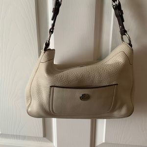 Gently used cream leather Coach purse